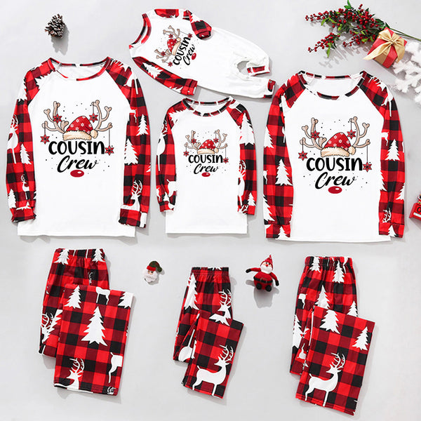 Cousin Crew Christmas pajama set with reindeer print